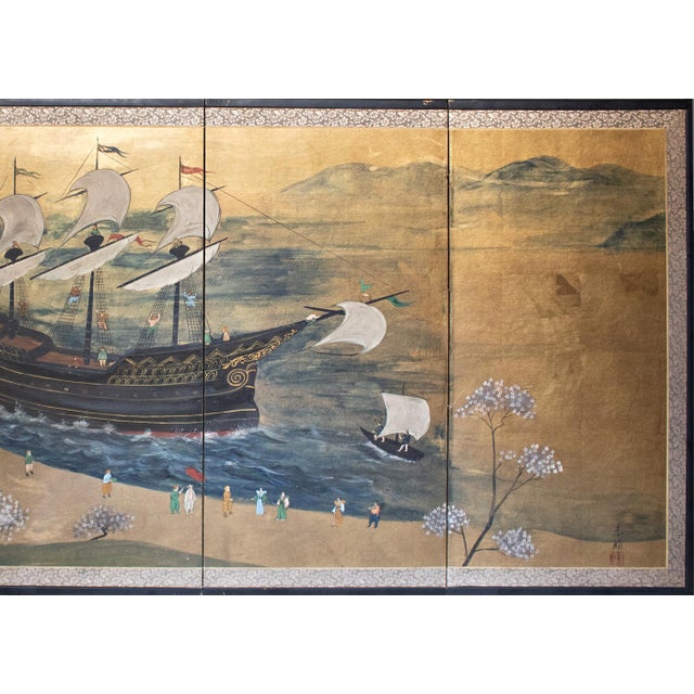 This circa 1930–1960s Japanese four-panel painted byobu (folding screen) depicts a panoramic Nanban-style black ship...
