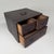 This compact, almost square cabinet is a traditional bunko (文庫): a portable storage piece for paperwork and small...