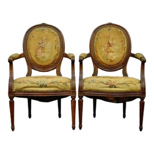 19th Century French Louis XVI Style Carved Walnut Needlepoint Arm Chairs - a Pair