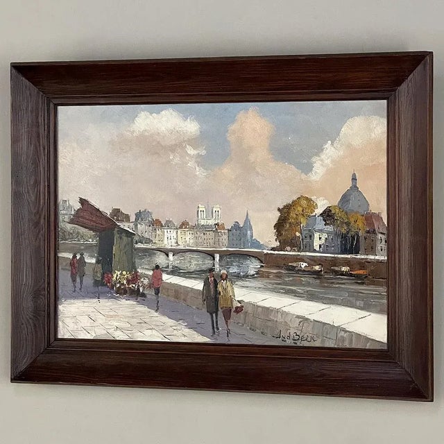 Vintage Framed Oil Painting on Canvas by J. van der Berk is an intriguing work that captures daily life in Paris along the...