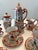 Detailed antique Japanese Kutani tea set 23 piece lot featuring colorful designs of geishas, pagodas, lanterns, cherry...