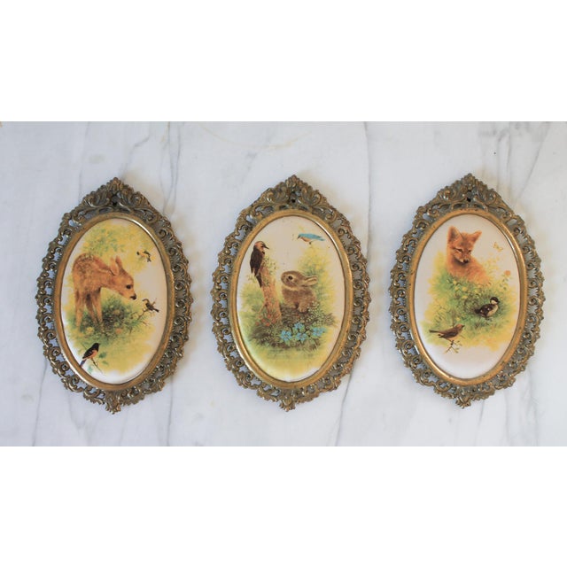 Set of three vintage baby animal wall hangings on silk in oval brass frames. Made in Italy. Some marks on framed bunny....