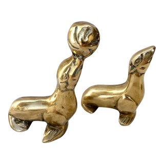 Vintage Pair of Brass Seal Figures For Sale