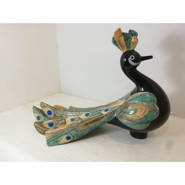 Beautiful and colorful ceramic peacock by Goebel West Germany dated 1984. Signed on the side of the tail by the author...