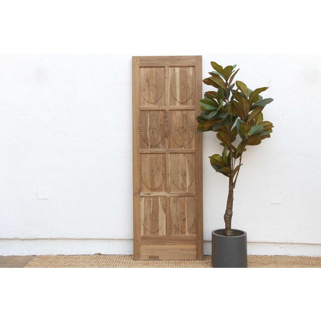 This captivating carved teak door embodys the exquisite fusion of Indian and Portuguese aesthetics that define Indo-...