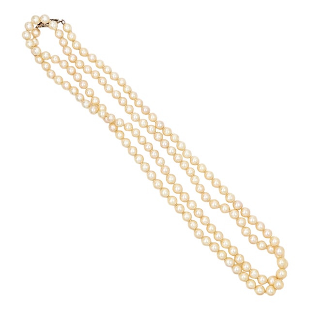 1960s Cultured Pearl 32 Inch Knotted Strand Necklace With 14k White Gold Filigree Clasp For Sale