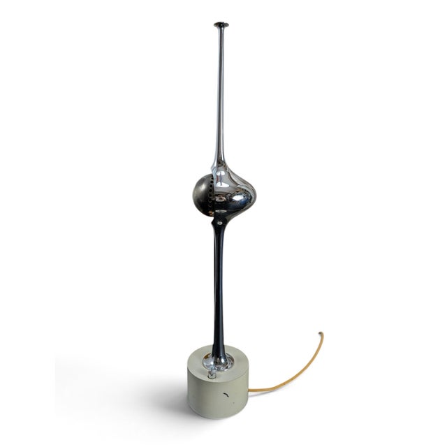 This table lamp is the iconic Cobra model (mod. 12919), designed by Angelo Lelli in the 1960s for the renowned Arredoluce...