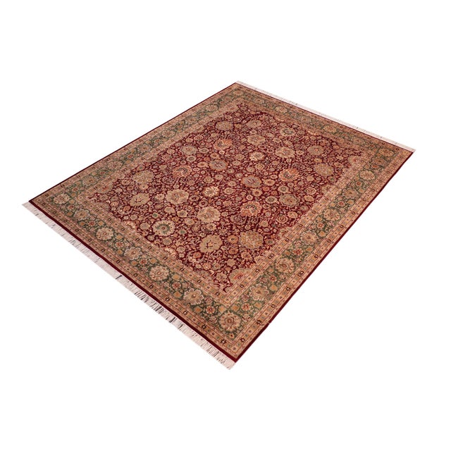 Designed with mesmerizing intricacy and gorgeous color palette, this hand-knotted masterpiece demonstrates the beauty and...