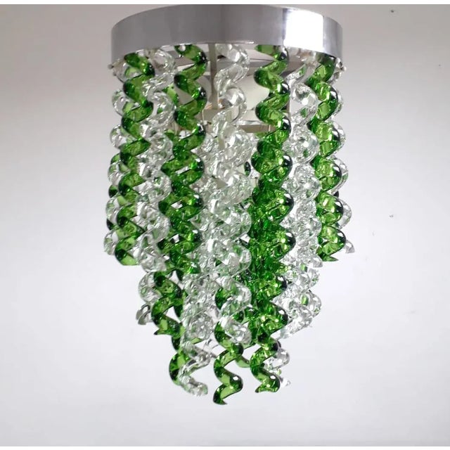 Vintage Italian flush mount or chandelier with hand blown clear and green Murano twist glasses, suspended from chrome...