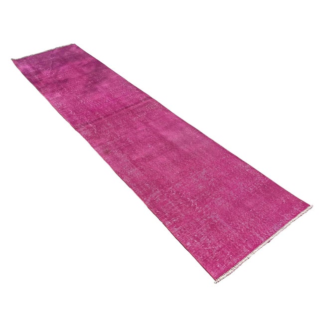 Introducing our Handmade Distressed Turkish Narrow Runner, measuring 305 x 70 cm, made from a combination of cotton and...