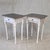 A charming pair of antique 1920s or 1930s pine nighstands that have been recently distress painted white in a Swedish...