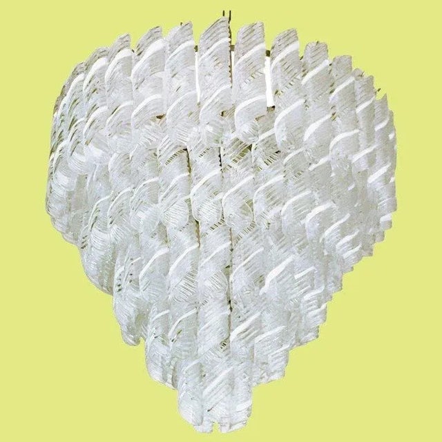 Italian chandelier with clear and white stripe Murano glasses hand blown to produce elegant swirls, mounted on chrome...
