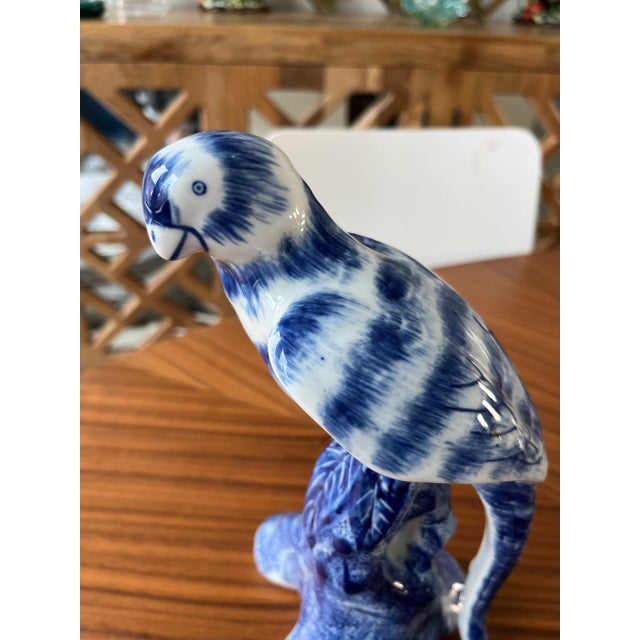 Add this hand-painted, blue and white, chinoiserie, avian beauty to any room of your home and add a little color and...