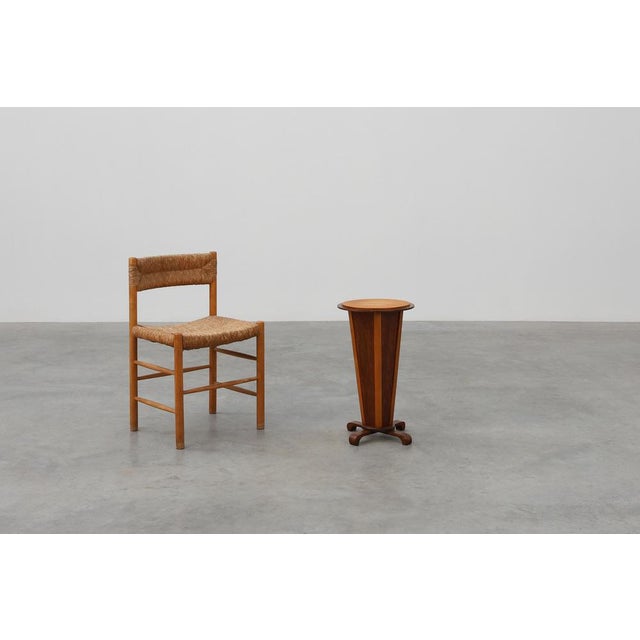 A refined and sculptural Art Deco side table from France, dating to the 1920s. This elegant piece showcases the geometric...