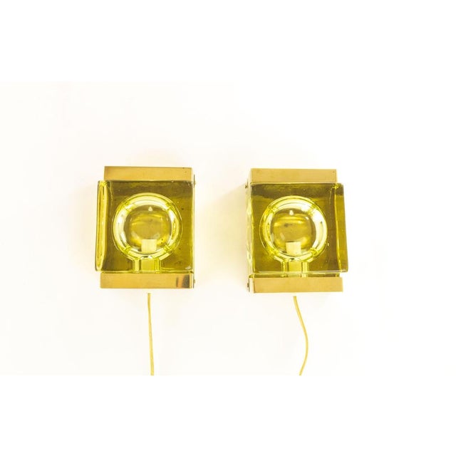 A pair of Maritim Lampet wall lamps, produced by Danish lighting manufacturer Vitrika in the 1970s. The version with the...