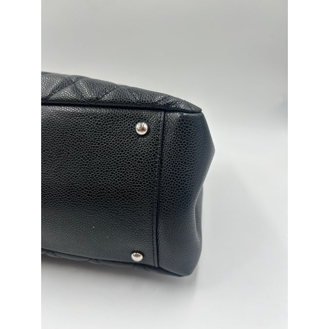 The Chanel Brown Quilted Leather Tote Bag is a refined and versatile piece that blends timeless Chanel elegance with...