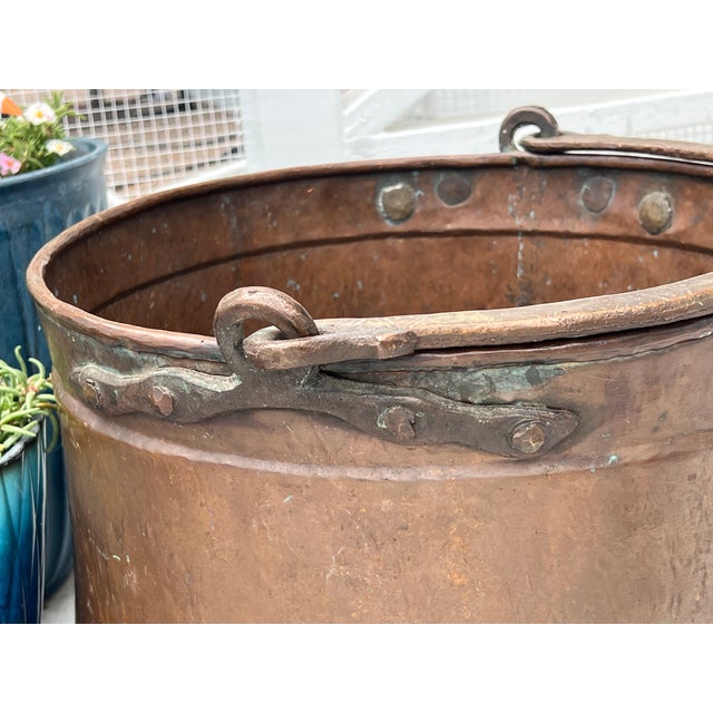 Metal Huge Antique Copper Cauldron: Hand Forged Firewood Bucket 19" With Hand Etched Riveted Handle Green Patina Damage For Sale - Image 7 of 14