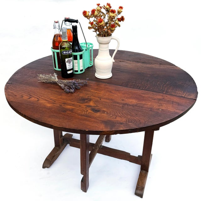 A beautiful mid-19th century French oak “table de vigneron”, once used by winemakers in the vineyards of rural France....