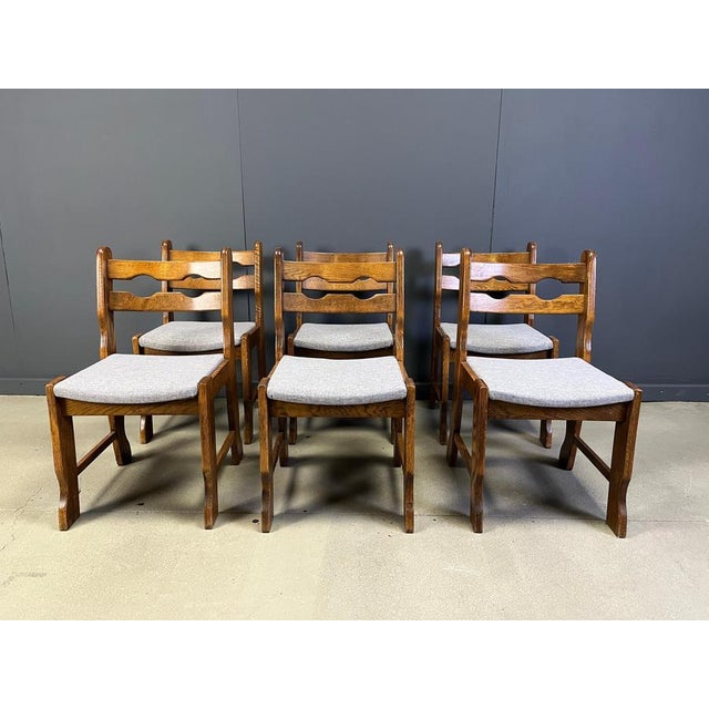 Nicely designed brutalist dining chairs with oak frames and fabric seats. Beautiful, timeless design which is very sturdy...