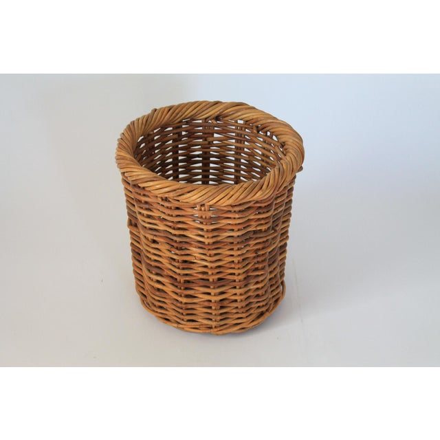 Vintage woven wicker wastebasket. No maker mark. Minor age wear.