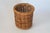 Vintage woven wicker wastebasket. No maker mark. Minor age wear.