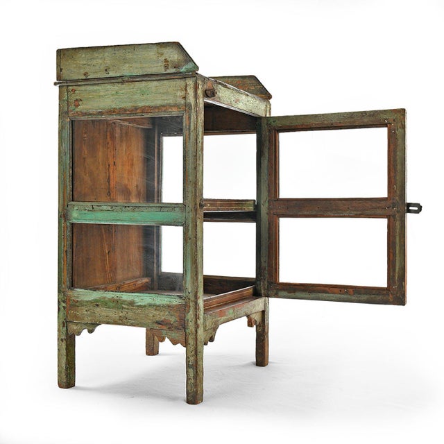 Wooden window with green patina. Height 86 cm, length 50 cm, depth 38 cm.