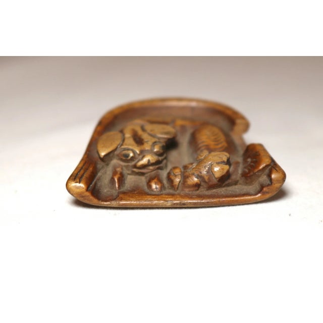 Up for sale is a rare antique early 19th century hand carved Japanese figural netsuke. It's sculpted out of a solid piece...