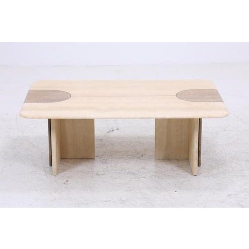 A beautiful vintage travertine coffee table from the 80s with a clean, flat design and striking natural stone texture. The...