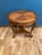 Very pretty side or accent table by Hekman Furniture Co. Hand carved legs. Side edges of table and bottom have burned...