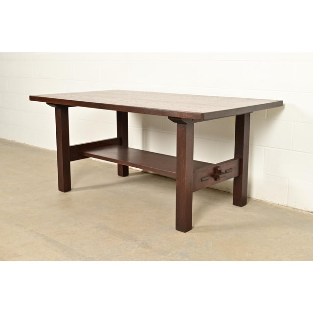 An exceptional antique Mission or Arts & Crafts period dining table, writing desk, or library table By Gustav Stickley...