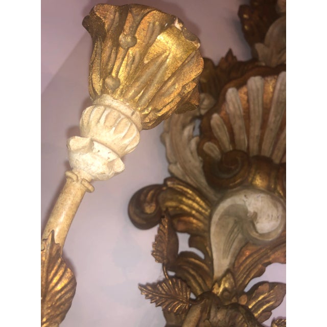 Lovely vintage Italian hand carved wood candelabra. Original hand painted finish, gilded and painted an Vintage white....