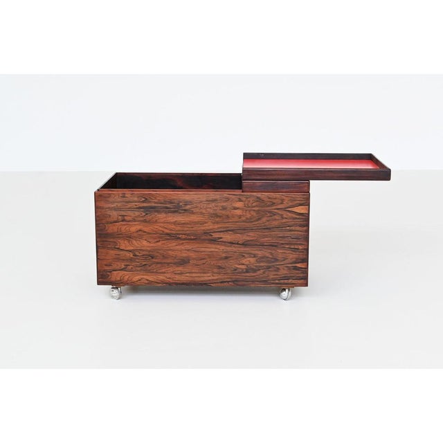 Beautiful decorative dry bar table designed by Poul Norreklit for Dyrlund, Denmark 1960. This typical Danish piece of...