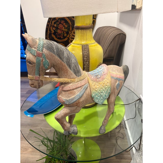 Great carved wooden horse . Asian , quite well done , beautiful having muted colors . Really a nice item for any home , I...
