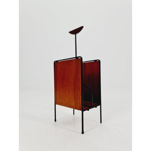 Danish Mid-Century Solid Teak Magazine Rack, 1960s. Dimensions: 18 D x 24 W x 60 H cm. This magazine rack is timeless and...