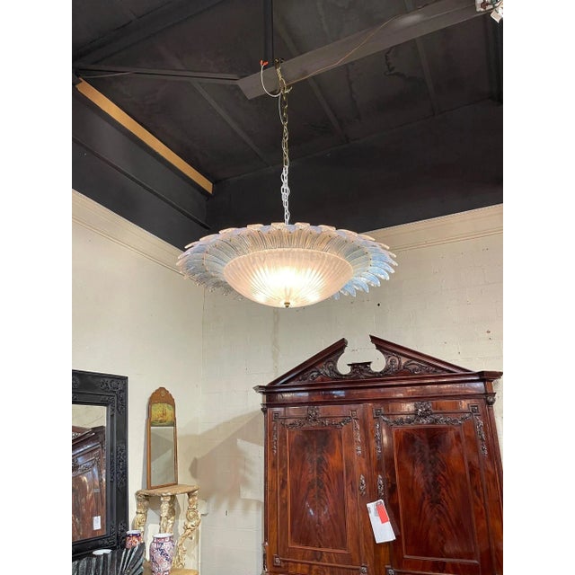 Modern Murano glass sunburst flush mount chandelier. The chandelier has been professionally re-wired, cleaned and is ready...