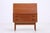 Vintage teak secretary desk by Arne Wahl Iversen with clean lines and a functional interior layout. Behind the writing...