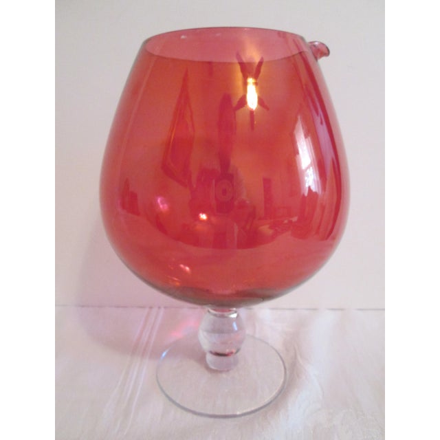 Red Glass Cocktail Bowl. Vibrant midcentury red glass cocktail bowl with clear glass base.