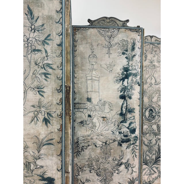 An exceptional hand painted Regence style six panel canvas screen with tape trim edging. Each panel depicting neoclassical...