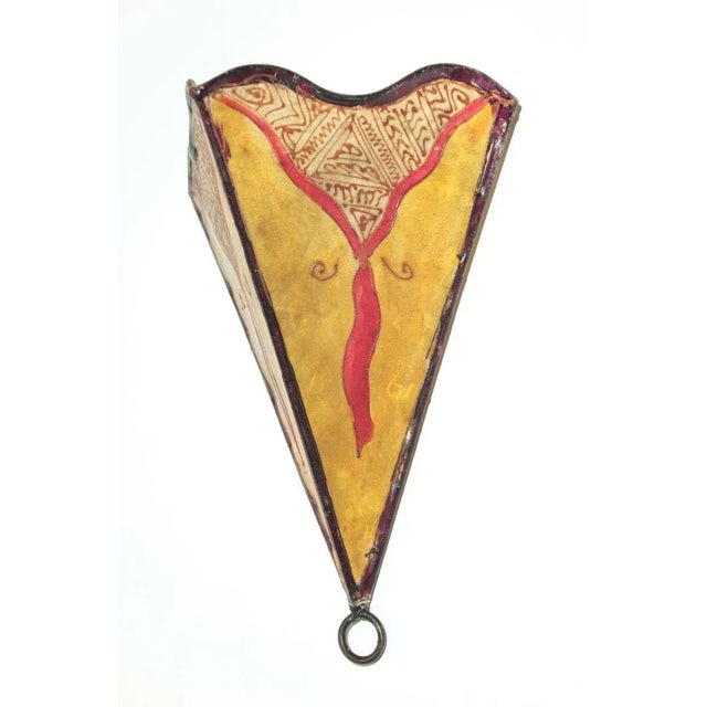African Tribal Art parchment wall shade sconce featuring a large triangle hide form stitched on iron and hand painted...