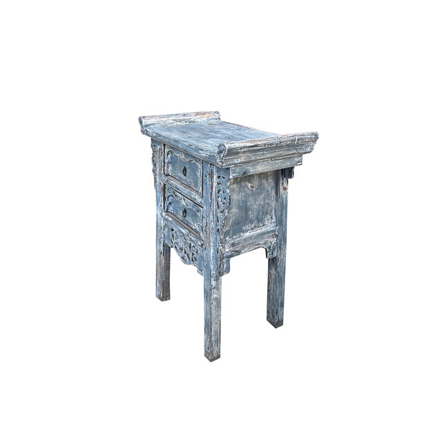 This side table exudes an elegant, antique charm with a distinct East Asian influence, likely inspired by traditional...