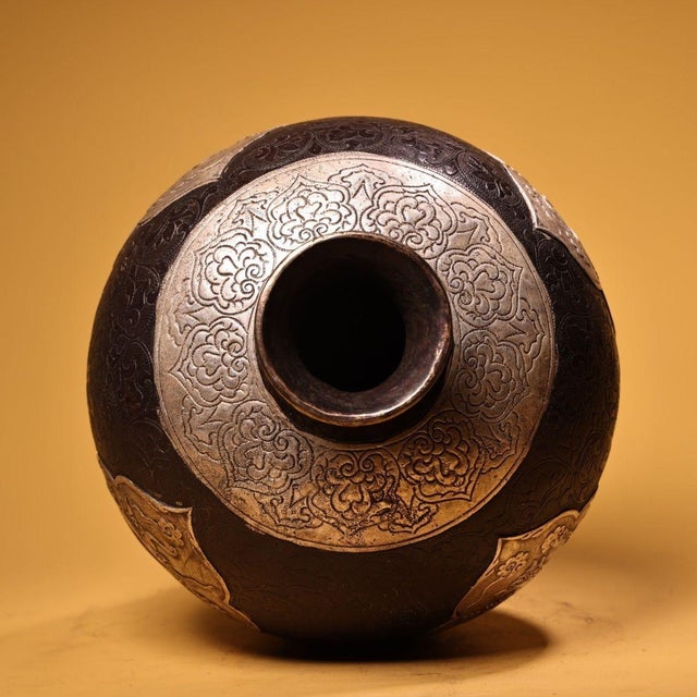 Elegant solid bronze meiping vase featuring intricate high-relief carving and silvered overlay depicting the Four Mythical...