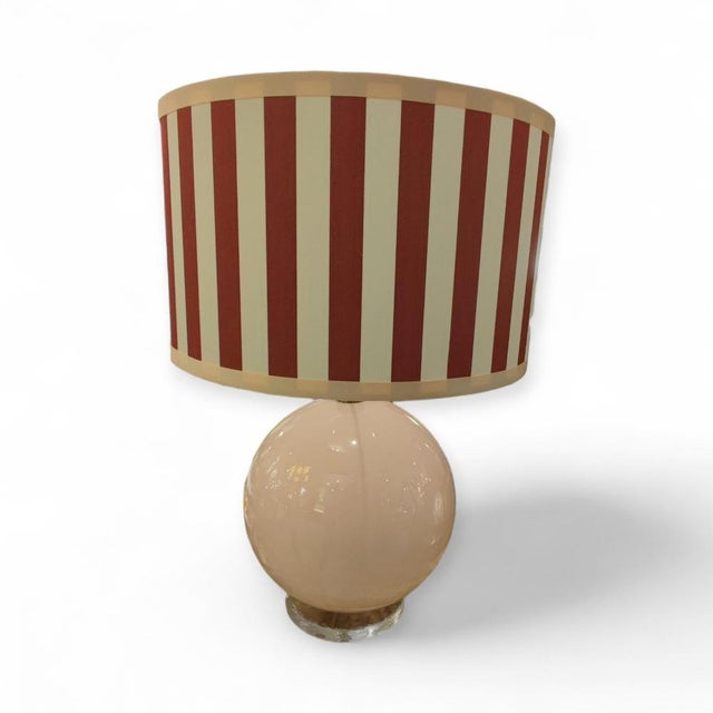 Pair of Murano glass globe lamps. The lamp body consists of two spheres: a larger, more prominent one in pastel pink, and...