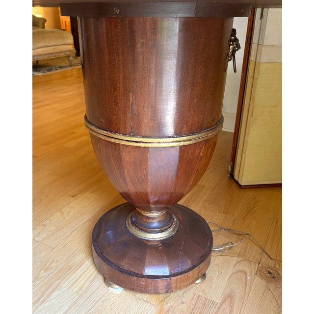 This rare antique Biedermeier walnut occasional/center table jardinere is a stunning piece of furniture with an oval...