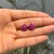 These rosette flower cluster stud earrings are crafted in 925 sterling silver and feature 2.9 carats of natural ruby in a...