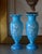 A pair of turquoise coloured opaline vases, with white painted flowers. Great quality and transparency. Perfect condtion.