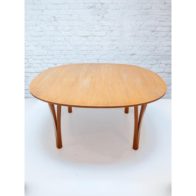 Coffee table designed by Piet Hein & Bruno Mathsson and produced by Fritz Hansen made in Denmark in 1990. This example of...