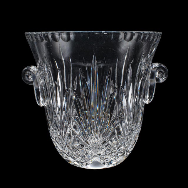 This is a vintage wine bottle cooler. An English, cut crystal champagne ice bucket, dating to the late 20th century, circa...