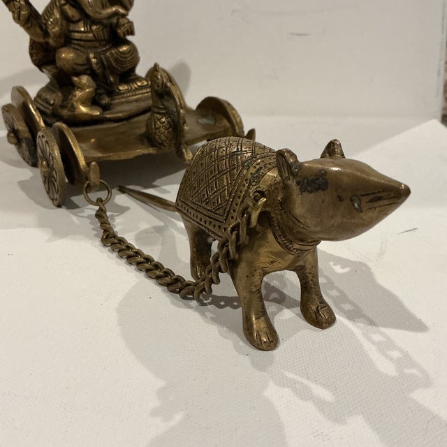 Ganesha - God of wisdom driven by Ganesha's vahan / Vehicle - The Mouse handcrafted by skilled artisans in fine quality...