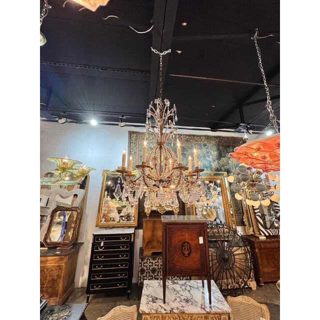 This 19th century Italian beaded crystal chandelier is a luxurious and elegant lighting fixture . The intricate design and...
