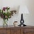 Beautiful brutalist iron table lamp from France, 1950s. Iron body with curved pedestal base and circle detail. Newly re-...